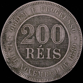 Бразилия. 200 рейсов 1889 г. Вес 14,92 г. Медно-никелевый сплав Бразилия. 200 рейсов 1889 г. Вес 14,92 г. Медно-никелевый сплав