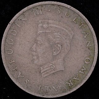 Бруней. 5 сенов 1967 г. Медно-никелевый сплав Бруней. 5 сенов 1967 г. Медно-никелевый сплав