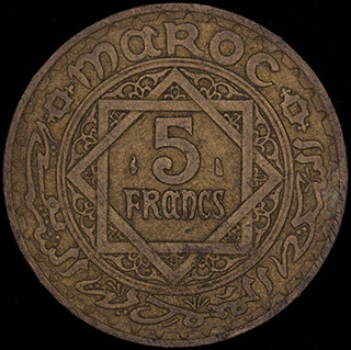 Марокко. 5 франков 1365 (1946) г. Алюминиевая бронза Марокко. 5 франков 1365 (1946) г. Алюминиевая бронза