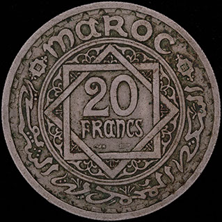 Марокко. 20 франков 1366 (1947) г. Медно-никелевый сплав Марокко. 20 франков 1366 (1947) г. Медно-никелевый сплав